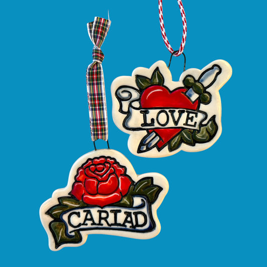 Romantic Tatoo Style Ceramic Decoration .Welsh Rose Decoration with Cariad (My Love).Santes Dwynwen gift.Ceramic Love Heart with a dagger Ornament with Ribbon.